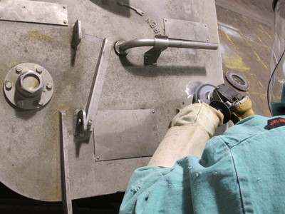 sanding a metal door