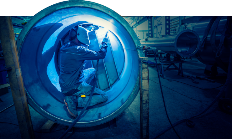 welding inside a large metal tube